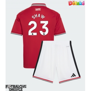 Manchester United Luke Shaw #23 Dětské Domácí dres komplet 2026-27 Krátký Rukáv (+ trenýrky)
